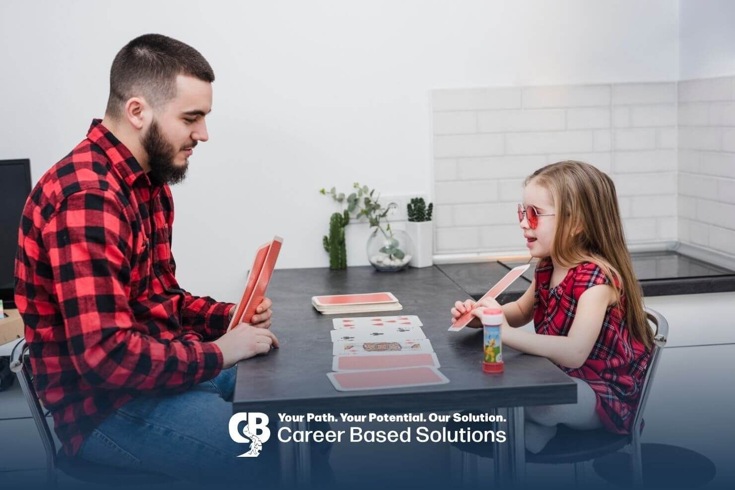 Therapist plays card game with autistic girl, building focus, communication, & social skills via ABA