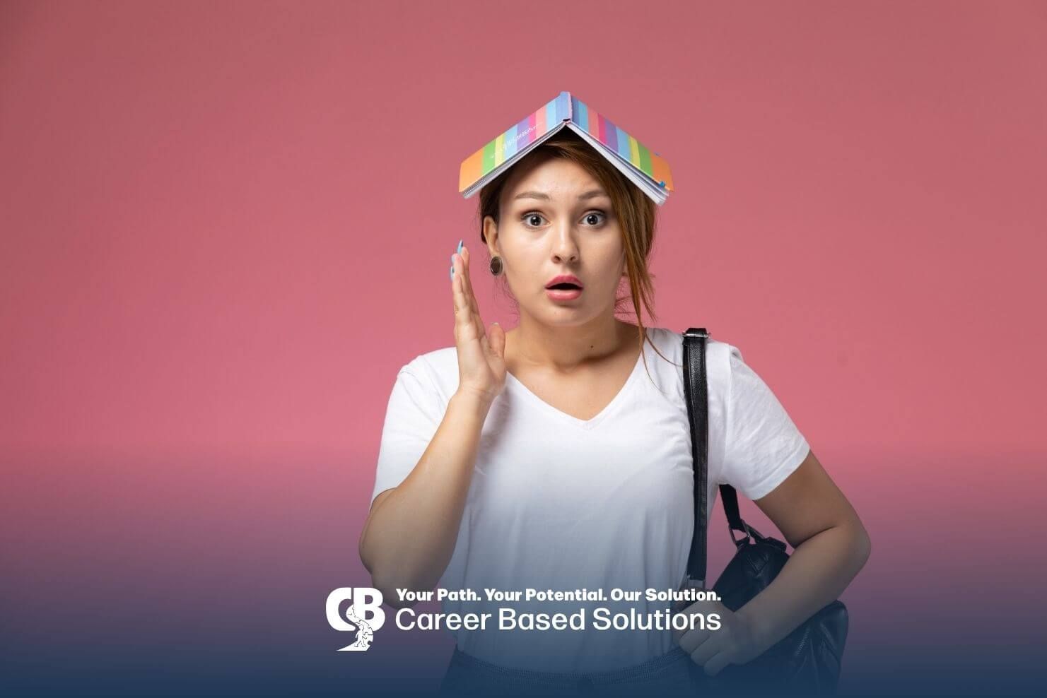 Surprised ABA student with books on head, representing BCBA learning journey and challenges.