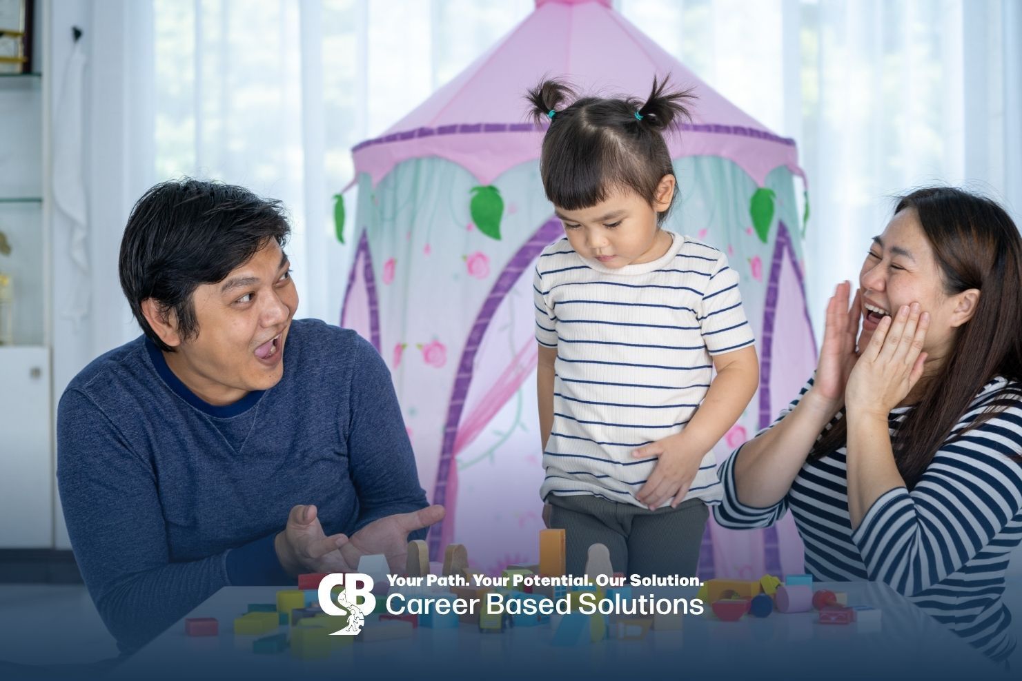 Therapist encourages autistic child with colorful blocks during joyful play‑based learning at home.