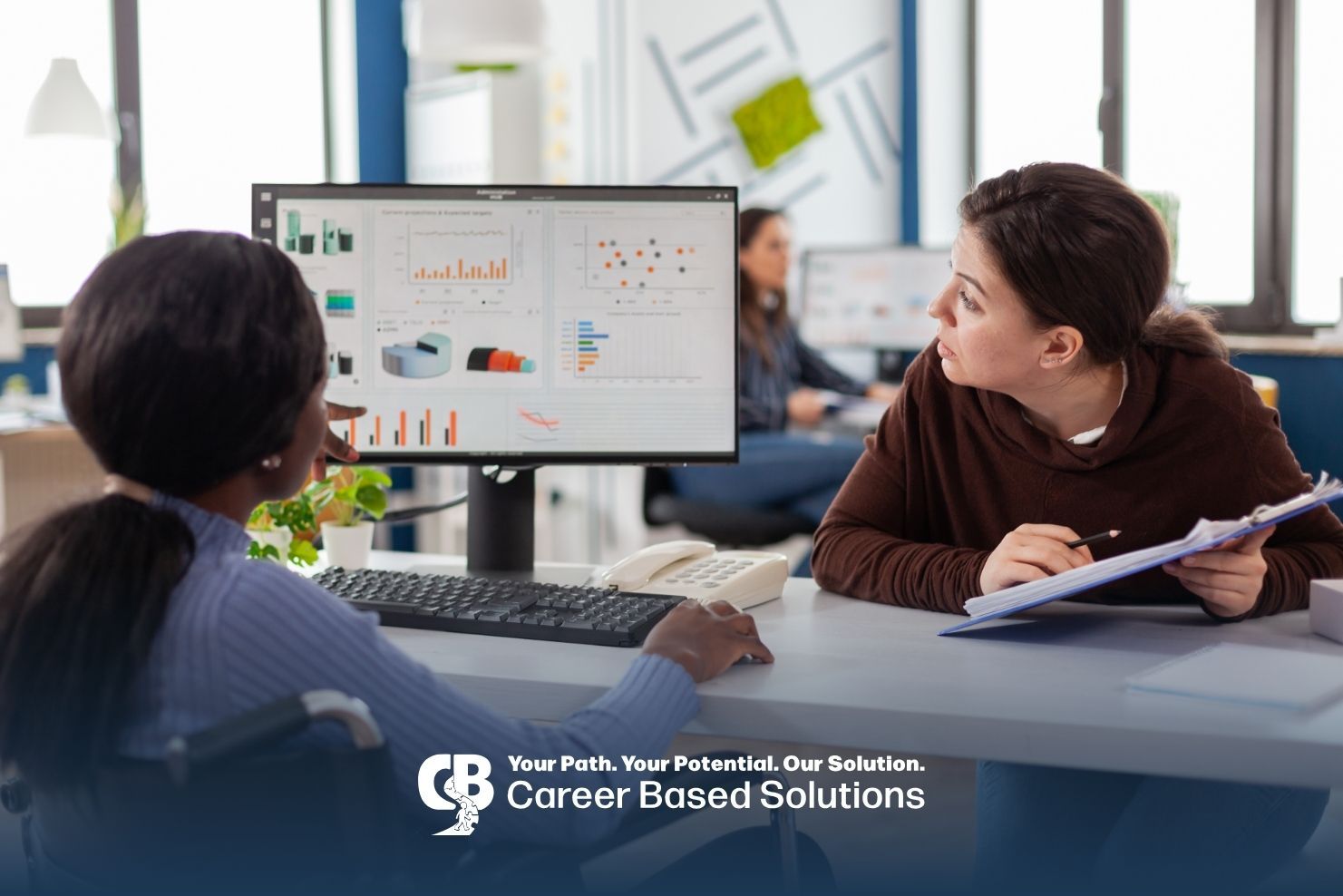Therapist reviews ABA progress data with a parent, explaining charts and treatment outcomes.