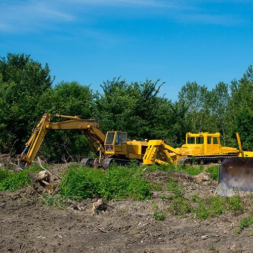 Excavator Clearing Land — Indianapolis, IN — Emanuel’s Tree Service