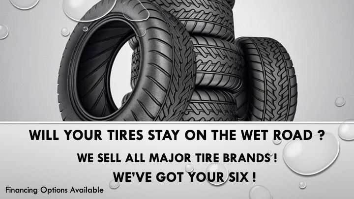 A stack of tires with the words will your tires stay on the wet road