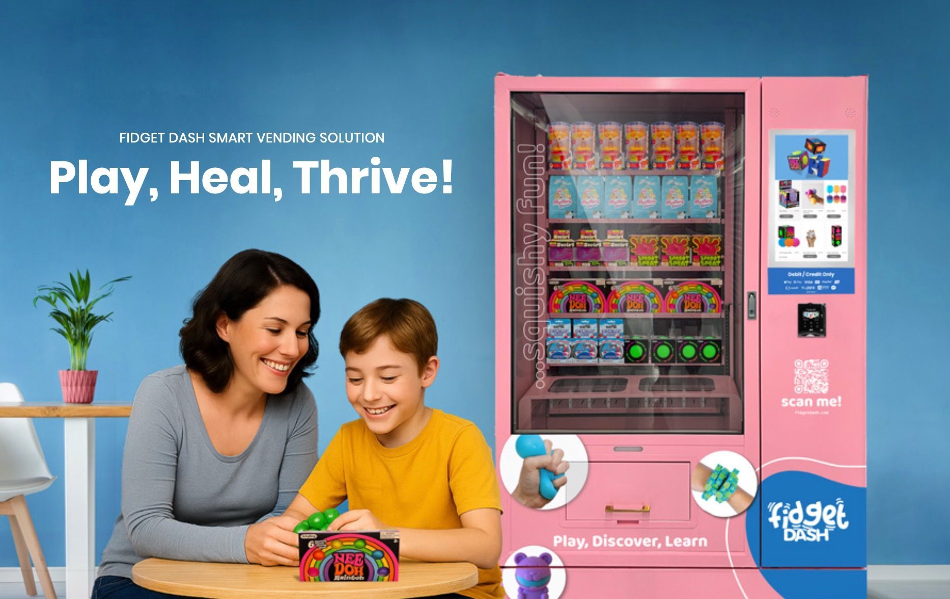 Woman and boy playing with fidget toys in front of a pink vending machine. 