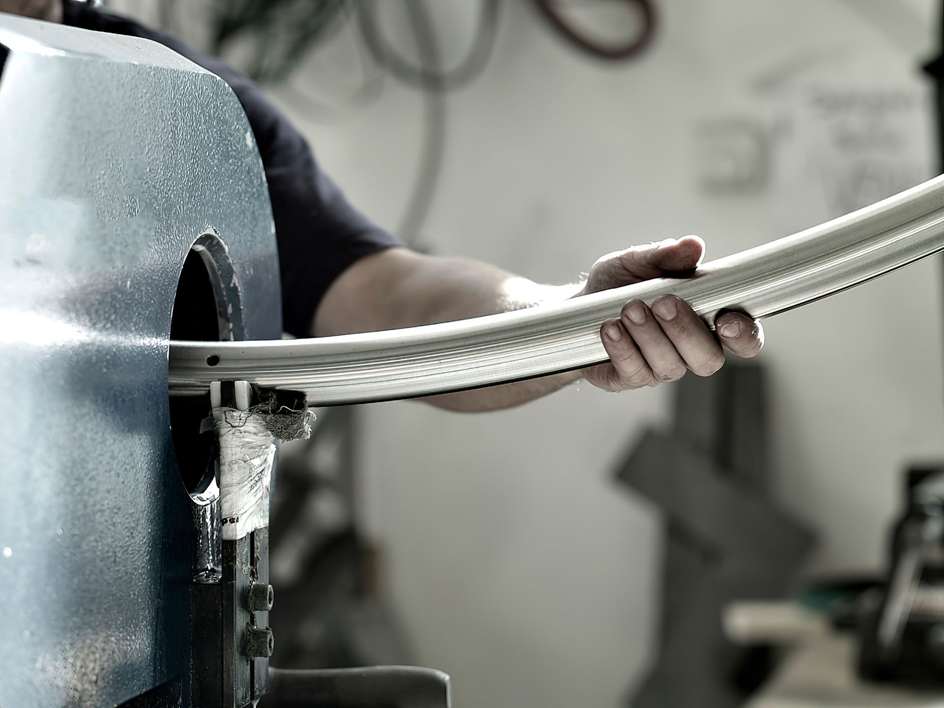 Man Bending a Metal Pipe — Houston, TX — H&H Tool Service Inc