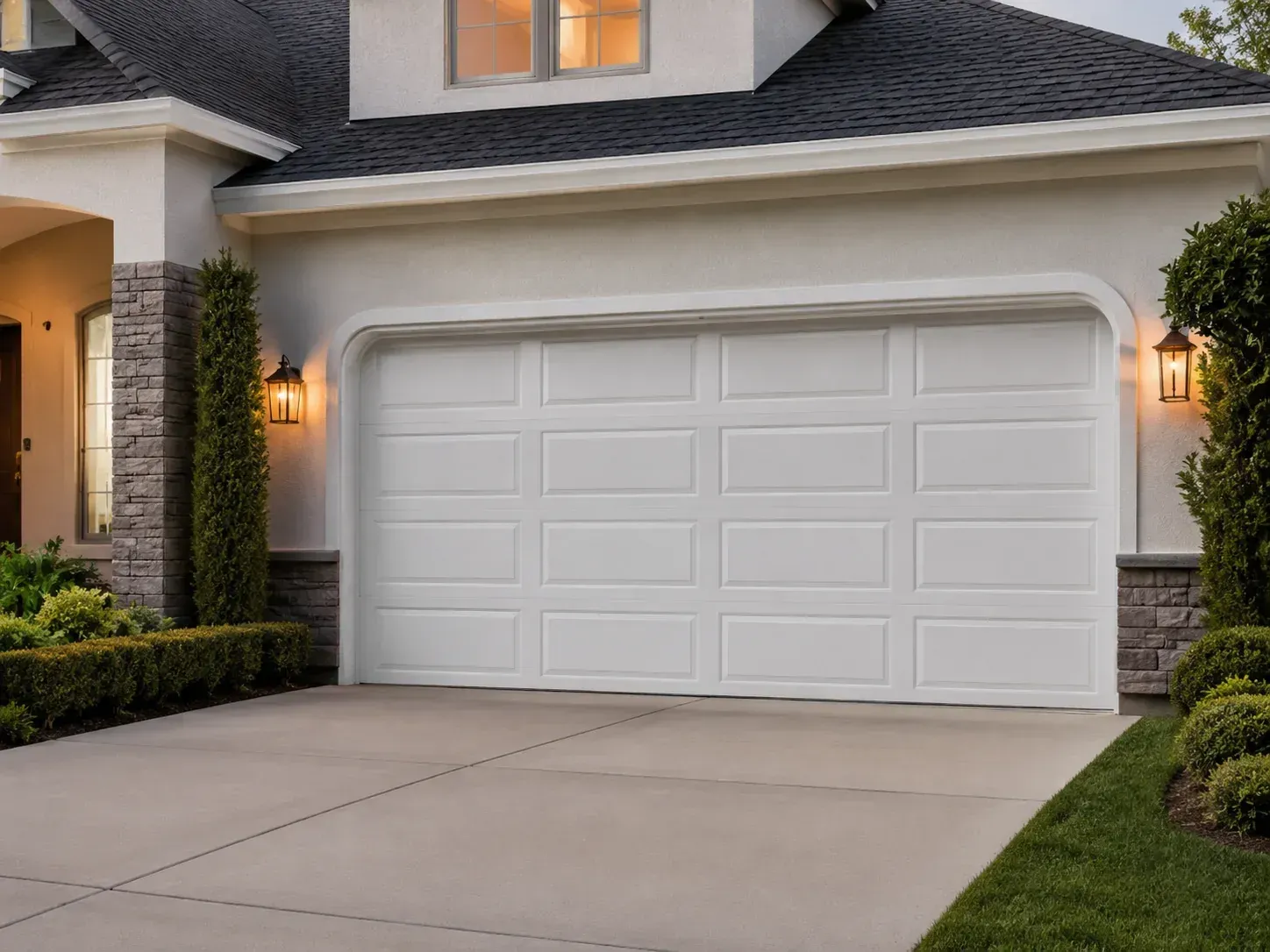 Traditional insulated garage door with top window panels