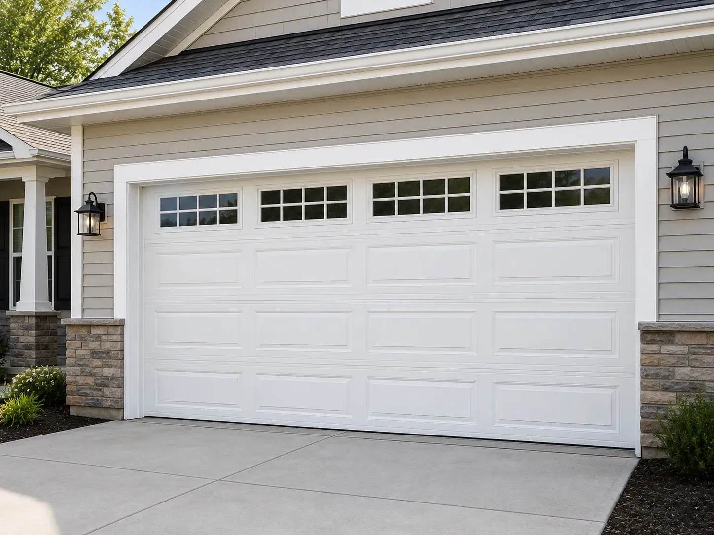 White residential garage door with top windows on a home in Roscoe IL