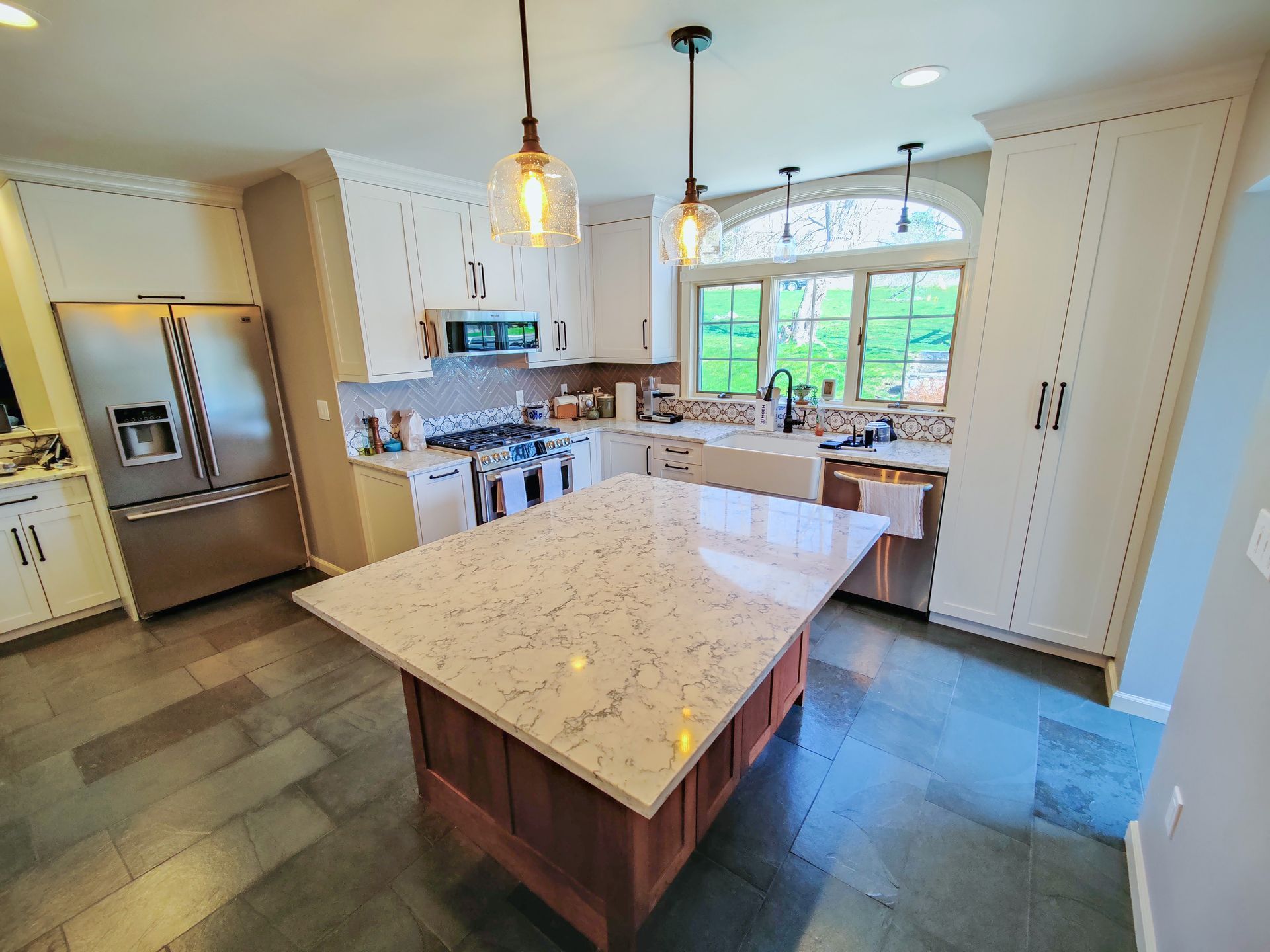 Kitchen island in Custom Interior & Design Winsted Project Completed