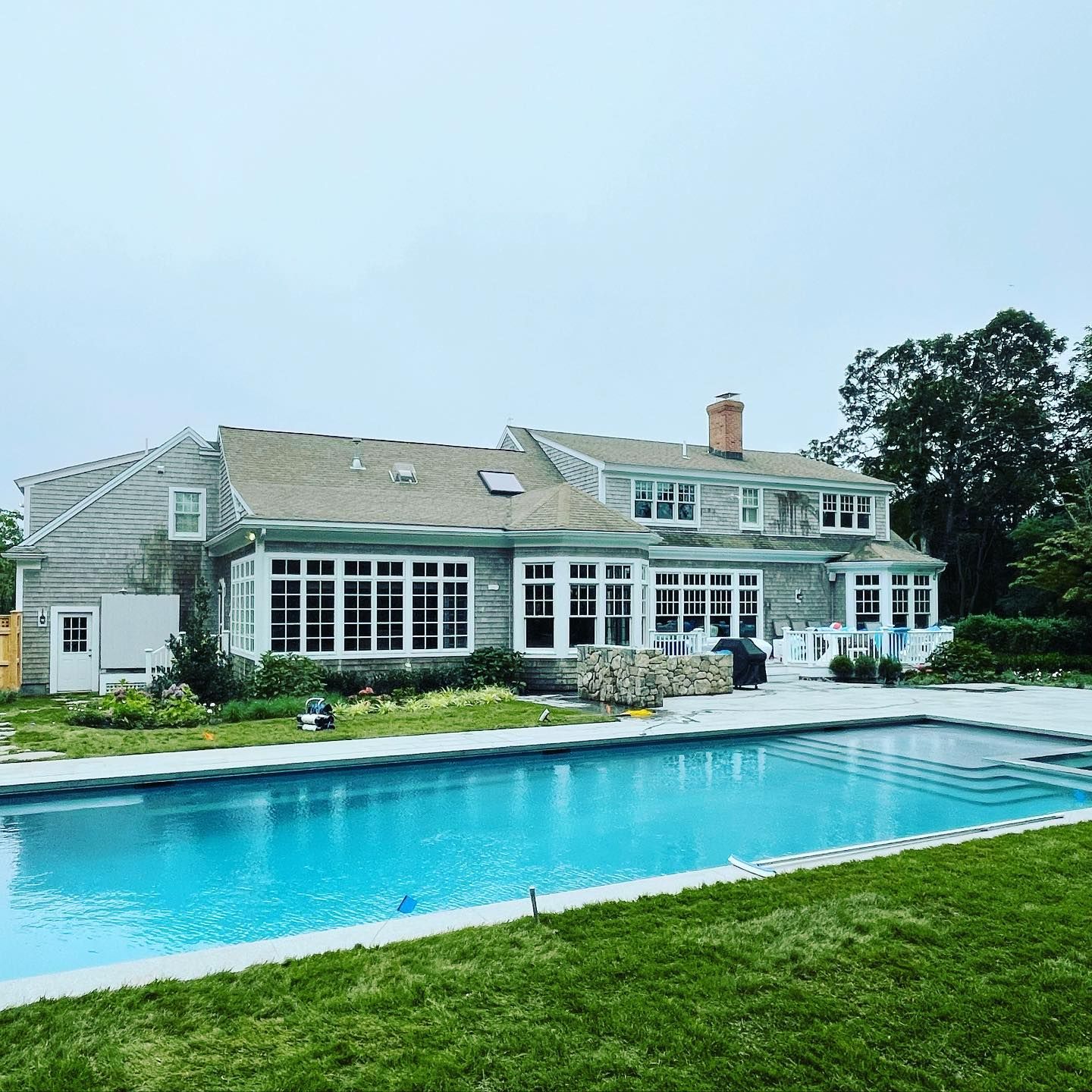 Exterior window cleaning for large Cape Cod home with pool | Professional window washing Cape Cod