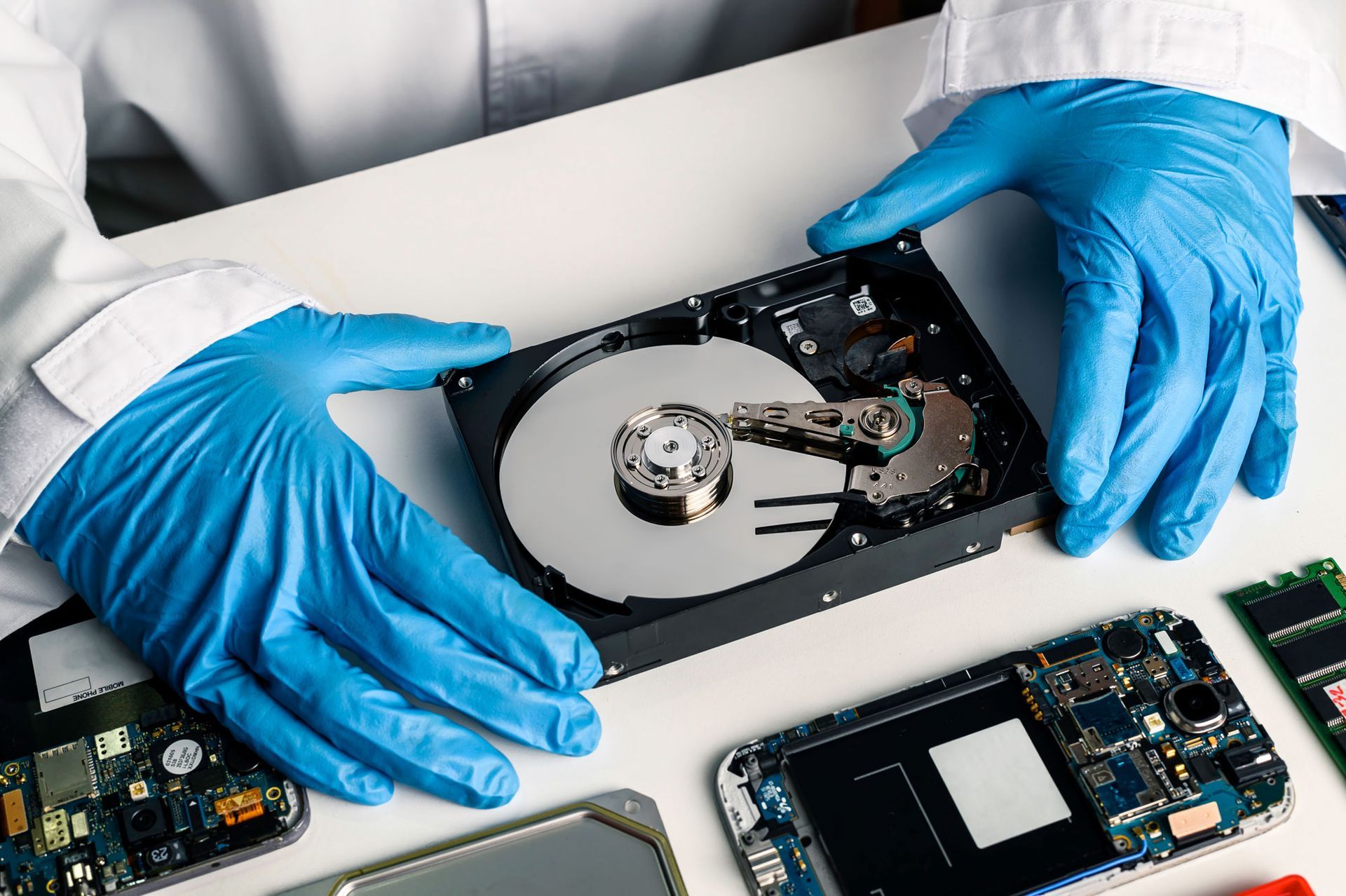 technician restoring data from a hard drive