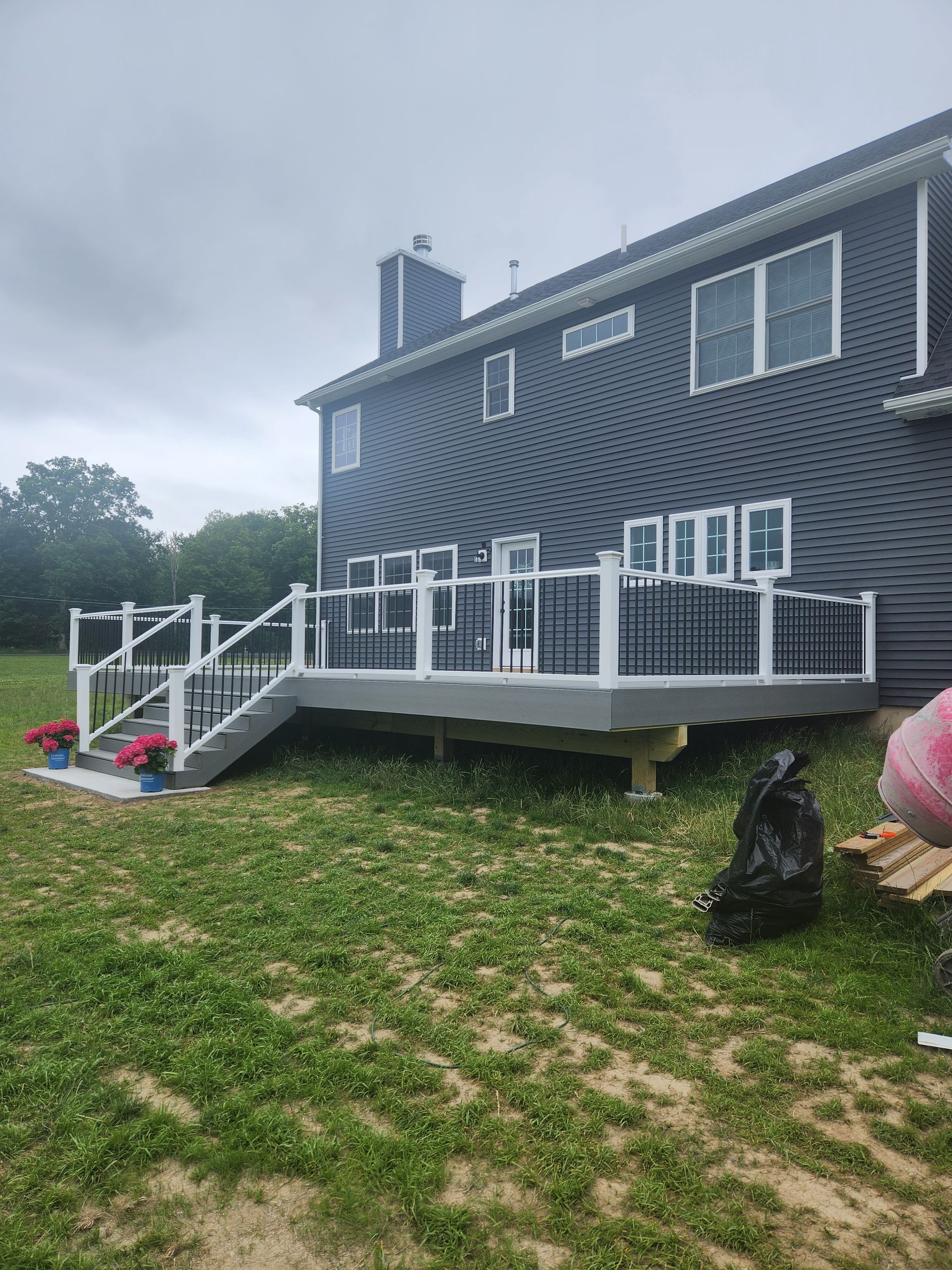 A large house with a large deck.