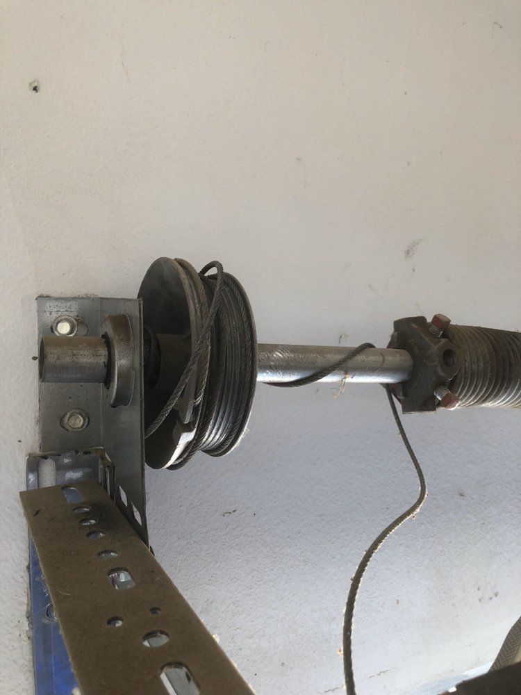 A close up of a garage door opener on a wall