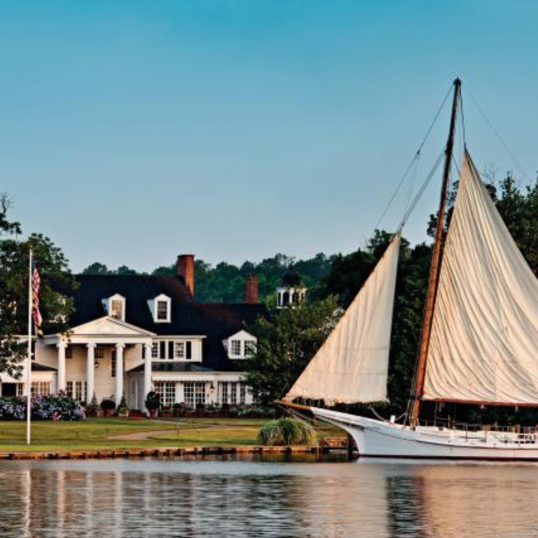 Saint Michaels, Maryland with boat and mansion 