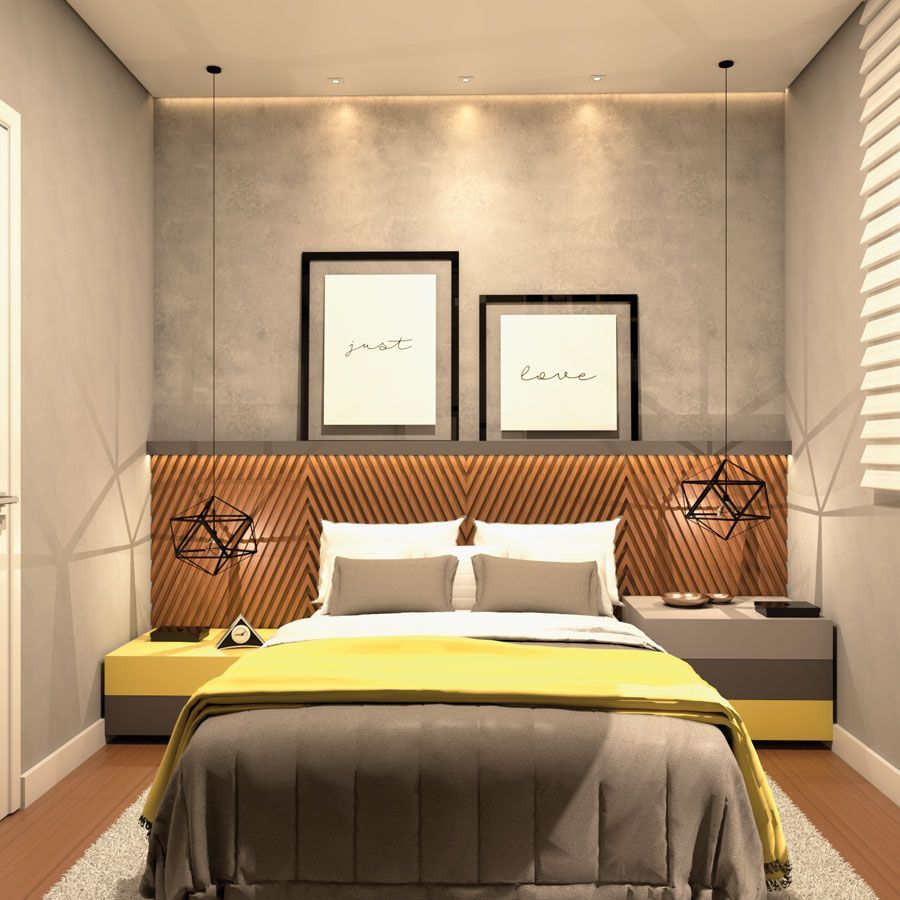 Um quarto com uma cama e dois quadros na parede