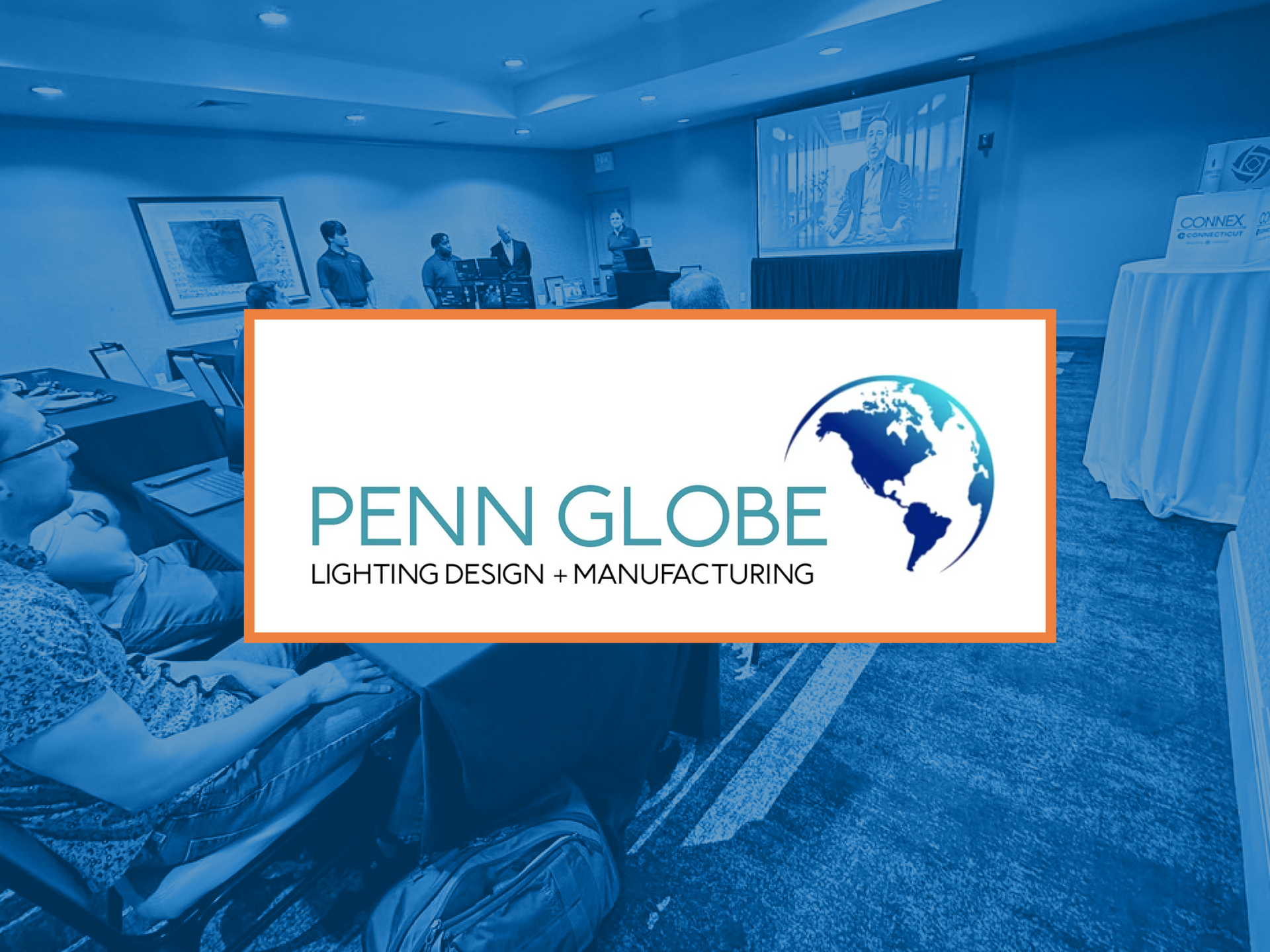 Penn Globe logo over a room with people, possibly a conference.