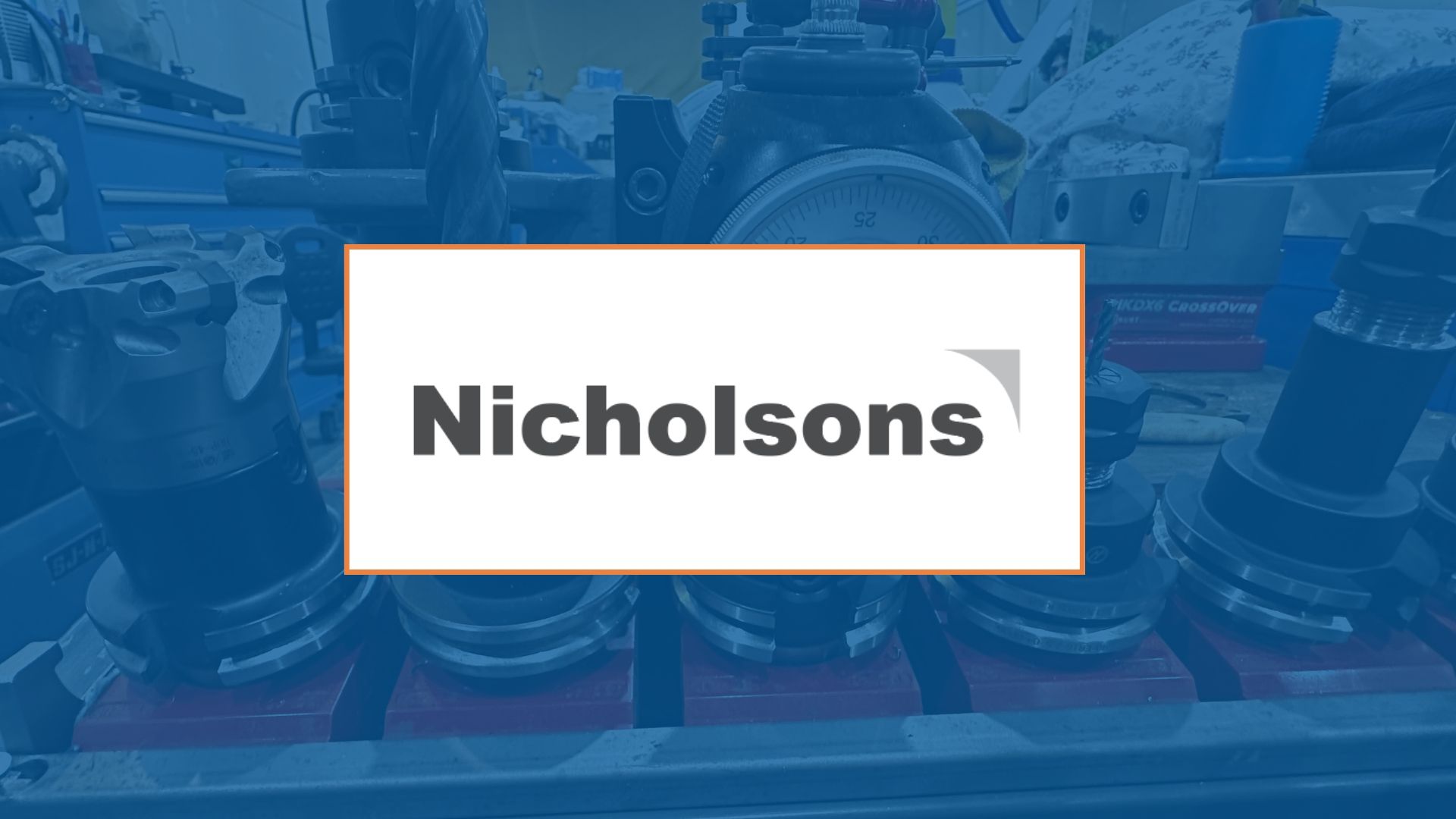 Nicholsons logo over a machine in a workshop.