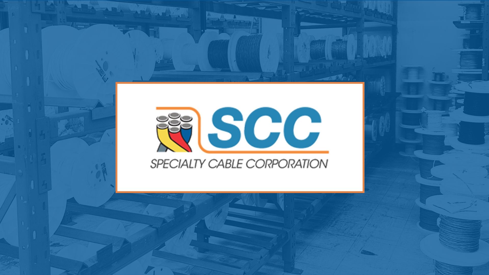 Logo of Specialty Cable Corporation (SCC) in a warehouse setting.