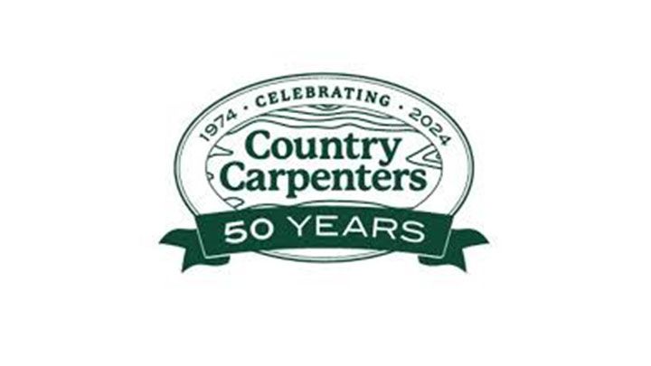 Logo for Country Carpenters, celebrating 50 years, with text and a wavy line design, on a white background.