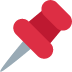 Red pushpin on a white background
