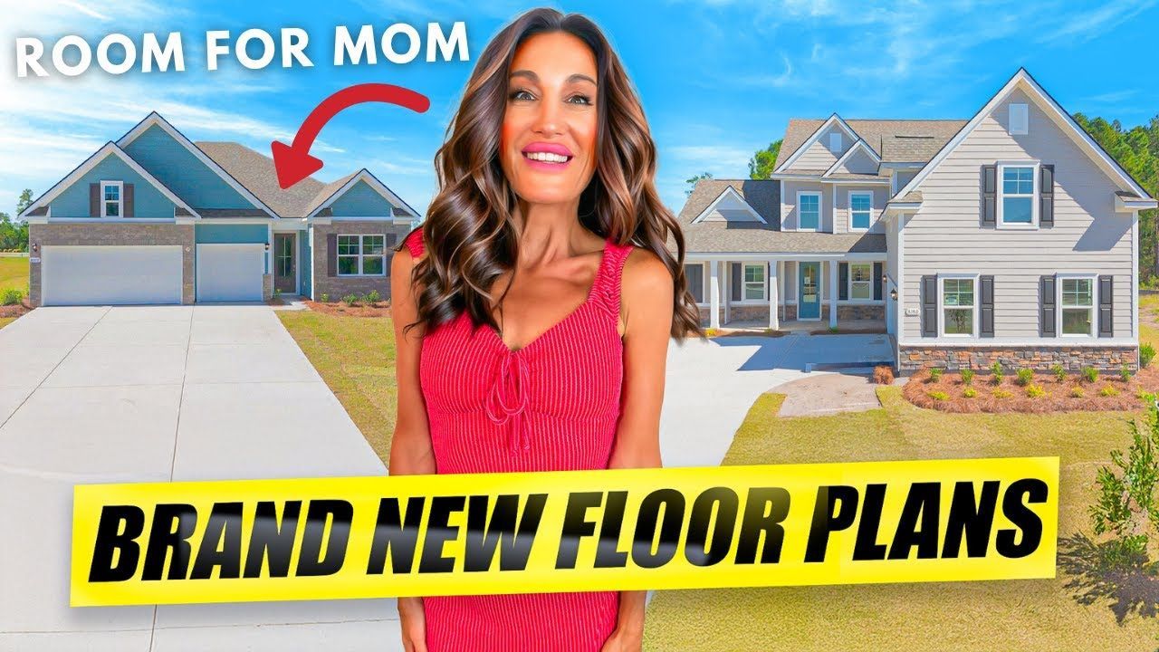 Woman in red dress in front of two houses,