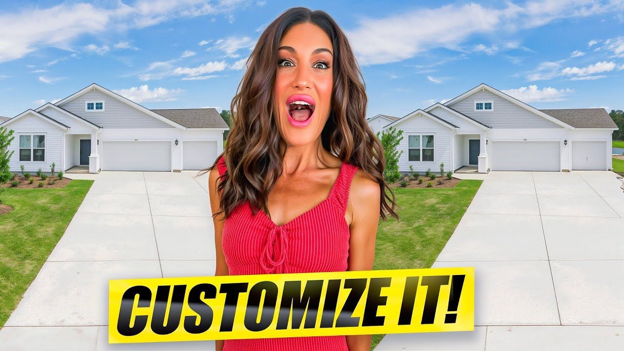 Woman in red dress with open mouth stands before two houses; 