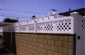 Durable Wall Construction — Wall with White Wood Fence in Anaheim, CA