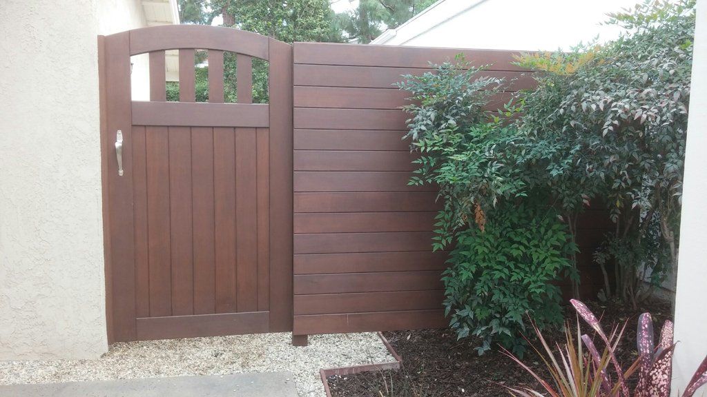 Iron Gates And Fences — Dark Brown Wooden Fence in Anaheim, CA