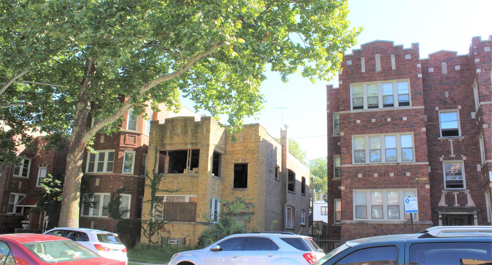 A bookstore filled with lots of books on shelves and tables.