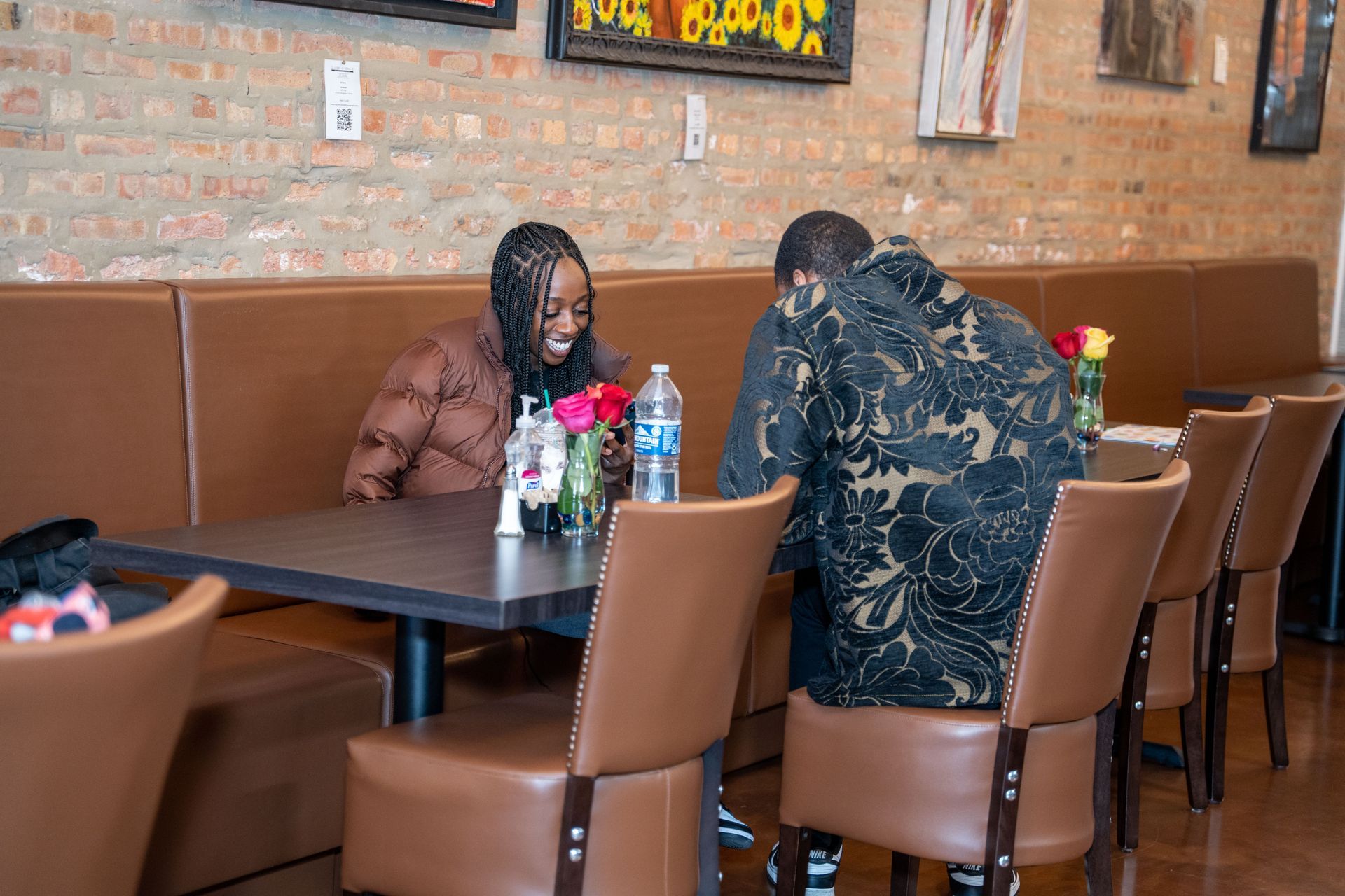 Couple dining at restaurant.