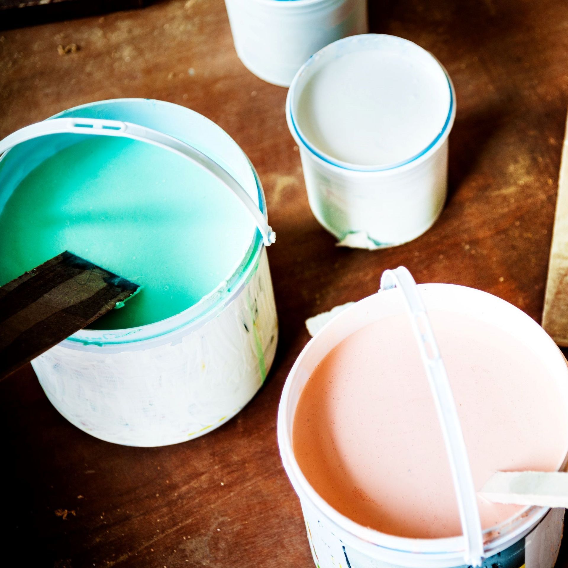 buckets of high-quality paint by Integrity House Painting