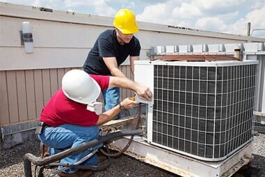 Two Men Fixing Air Condition - Air Conditioning Services in Langhorne, PA