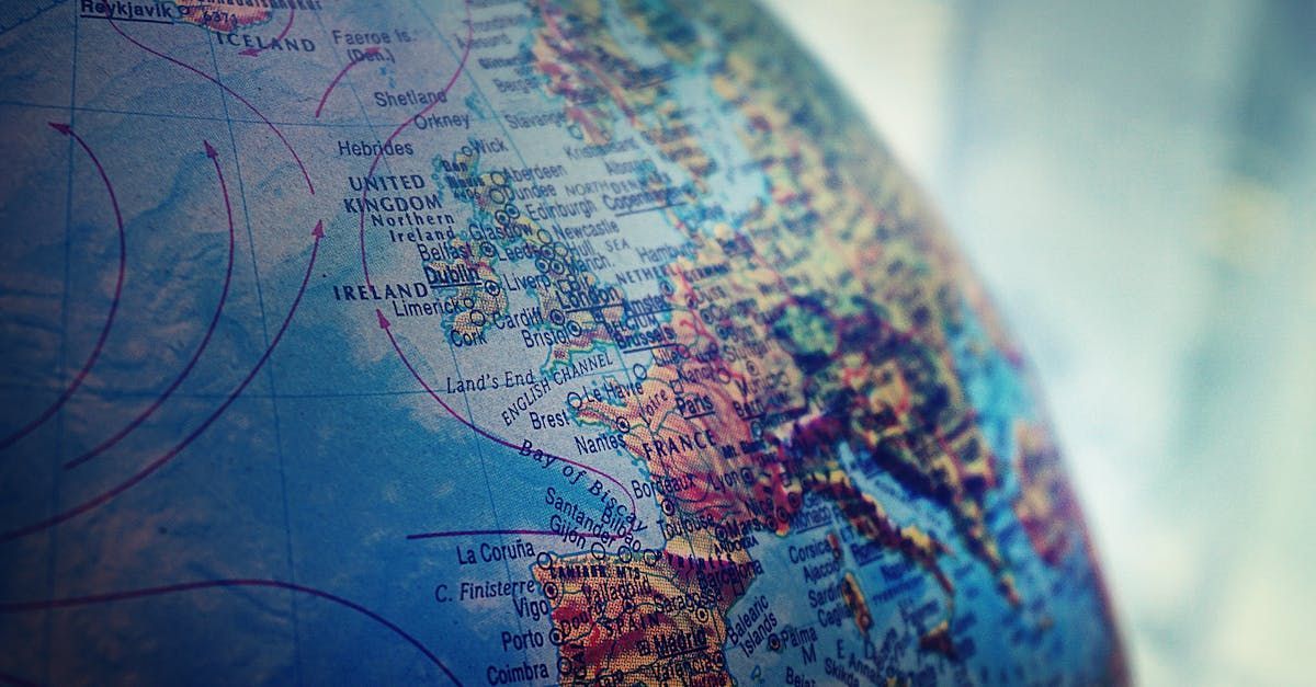 A close up of a globe with a map of the world on it.