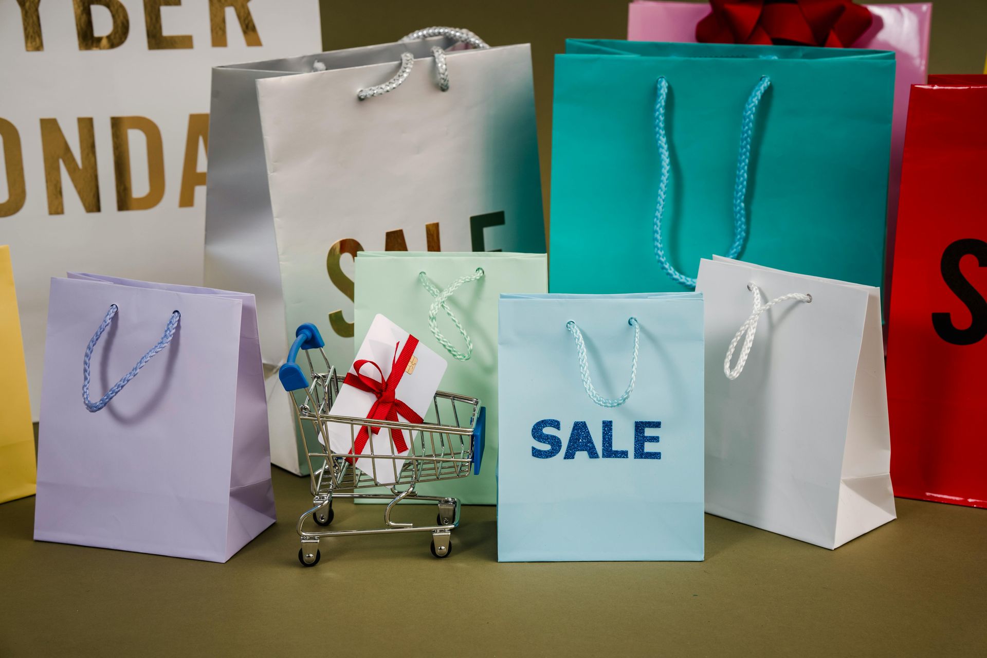 Shopping bags of various colors with 