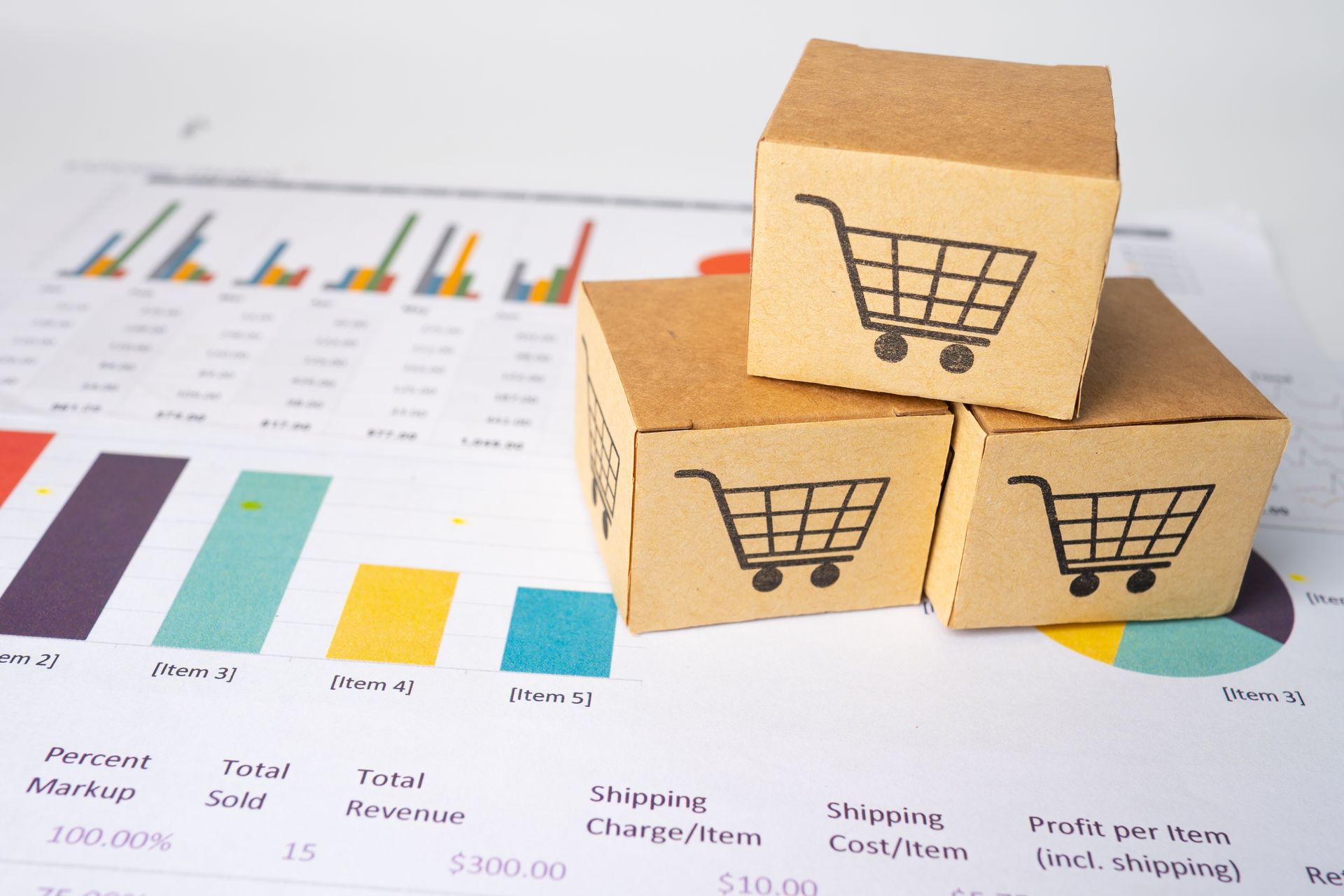 Three boxes with shopping carts on them are stacked on top of each other on a graph.
