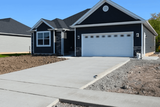 Concrete Company leveling a driveway in Cypress