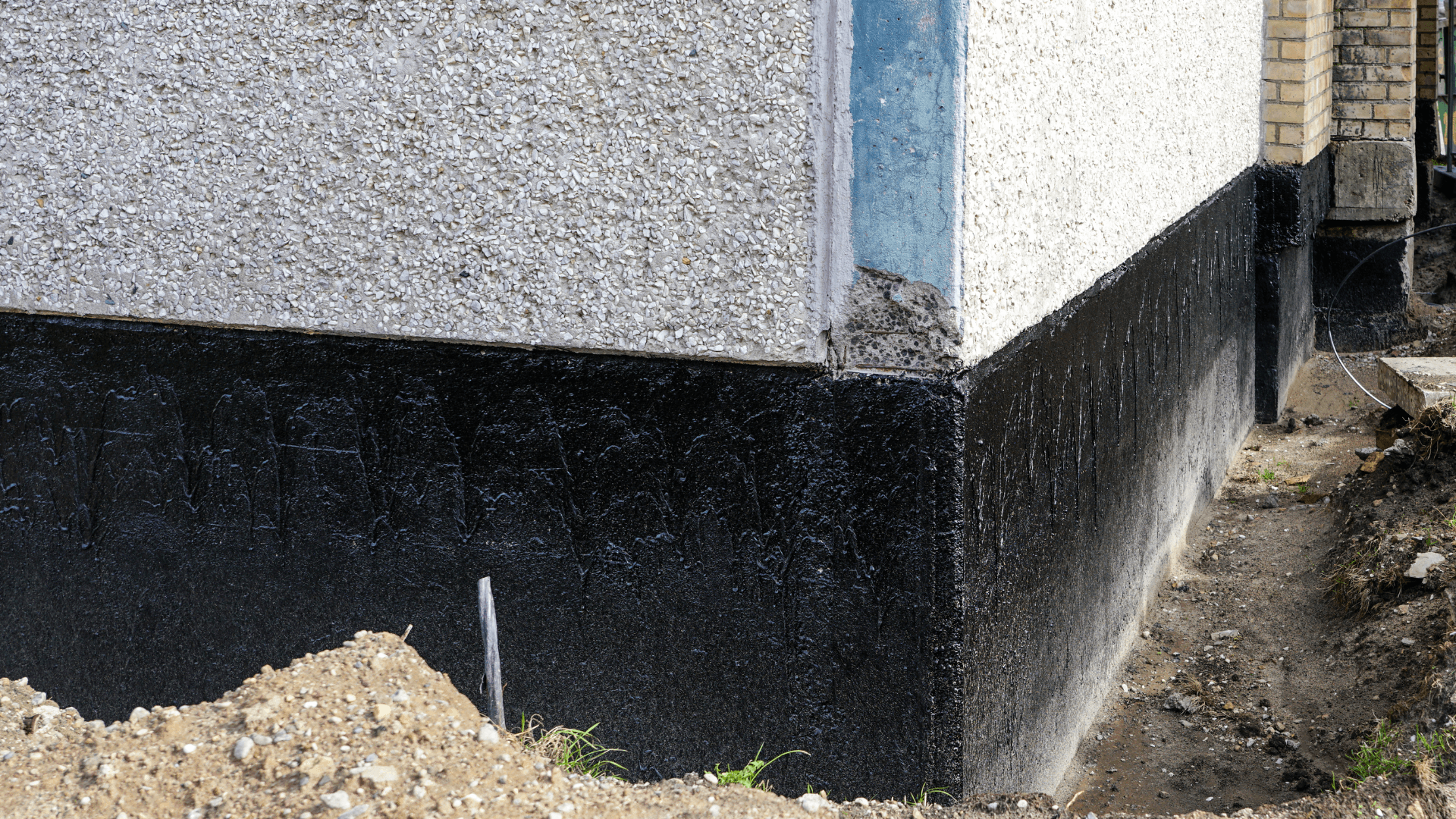 Concrete contractor reinforcing the foundation wall of a home in cypress tx