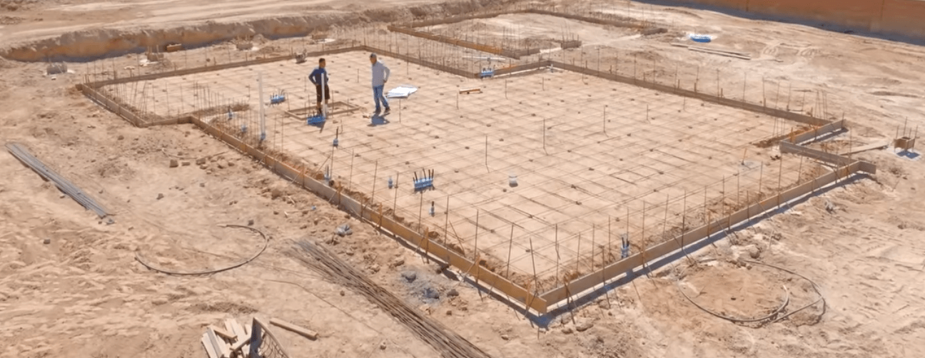 Concrete contractors pouring a new foundation for a home in cypress, TX