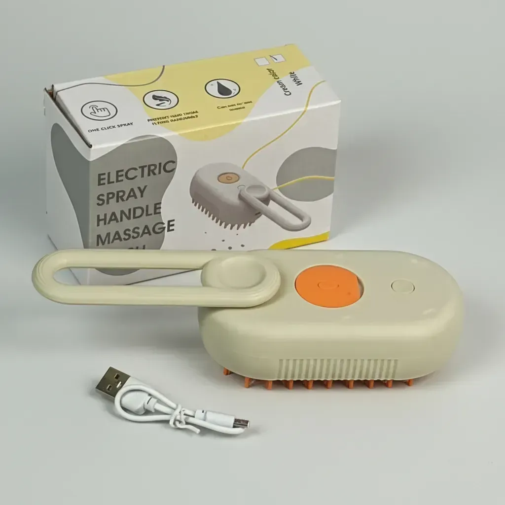 Cepillo masajeador eléctrico para mascotas con función de rociado, en caja y cable USB. Beige y naranja.