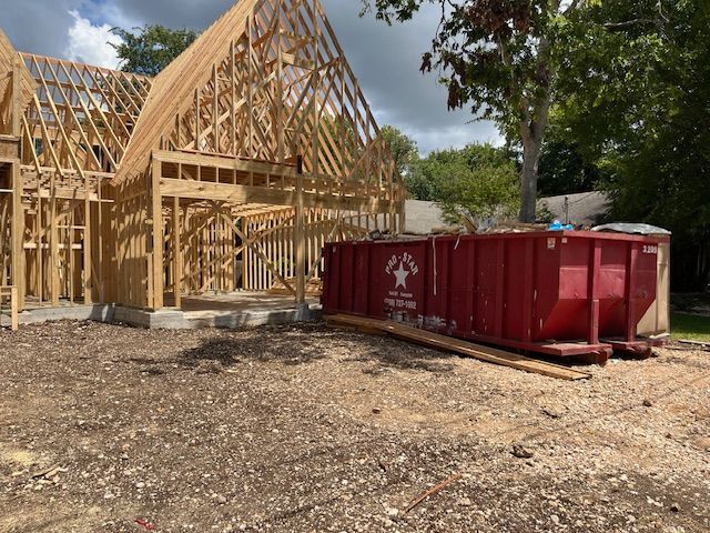 Construction Dumpster Rental — Dump Truck Unloading Dirt in New Braunfels, TX Construction Dumpster Rental — Dump Truck Unloading Dirt in New Braunfels, TX