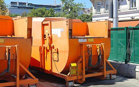 Waste Compactor — Orange Trash Compactor in New Braunfels, TX