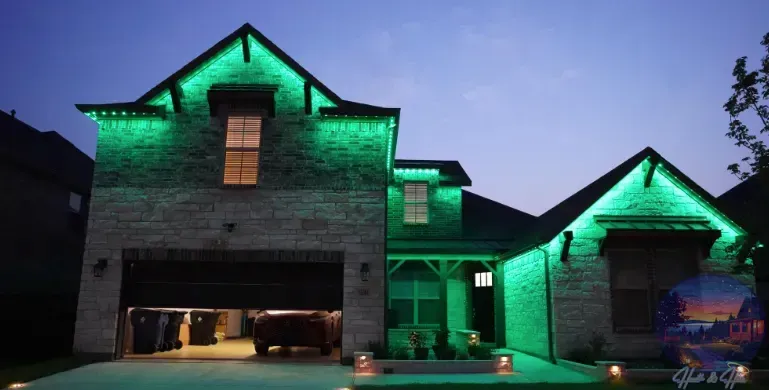 Two-story house with green lights outlining the roof, garage open with a car inside. Dusk setting.