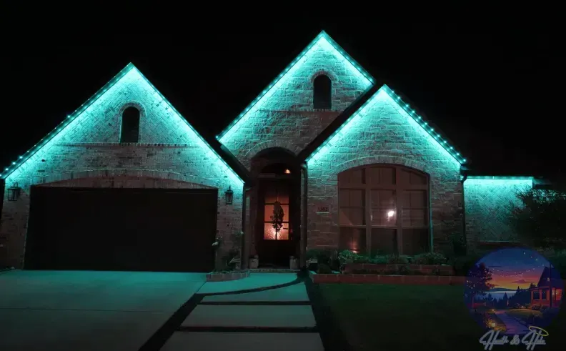 A house at night with teal lights outlining the roof and garage.