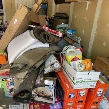 There is a lot of trash in the garage.