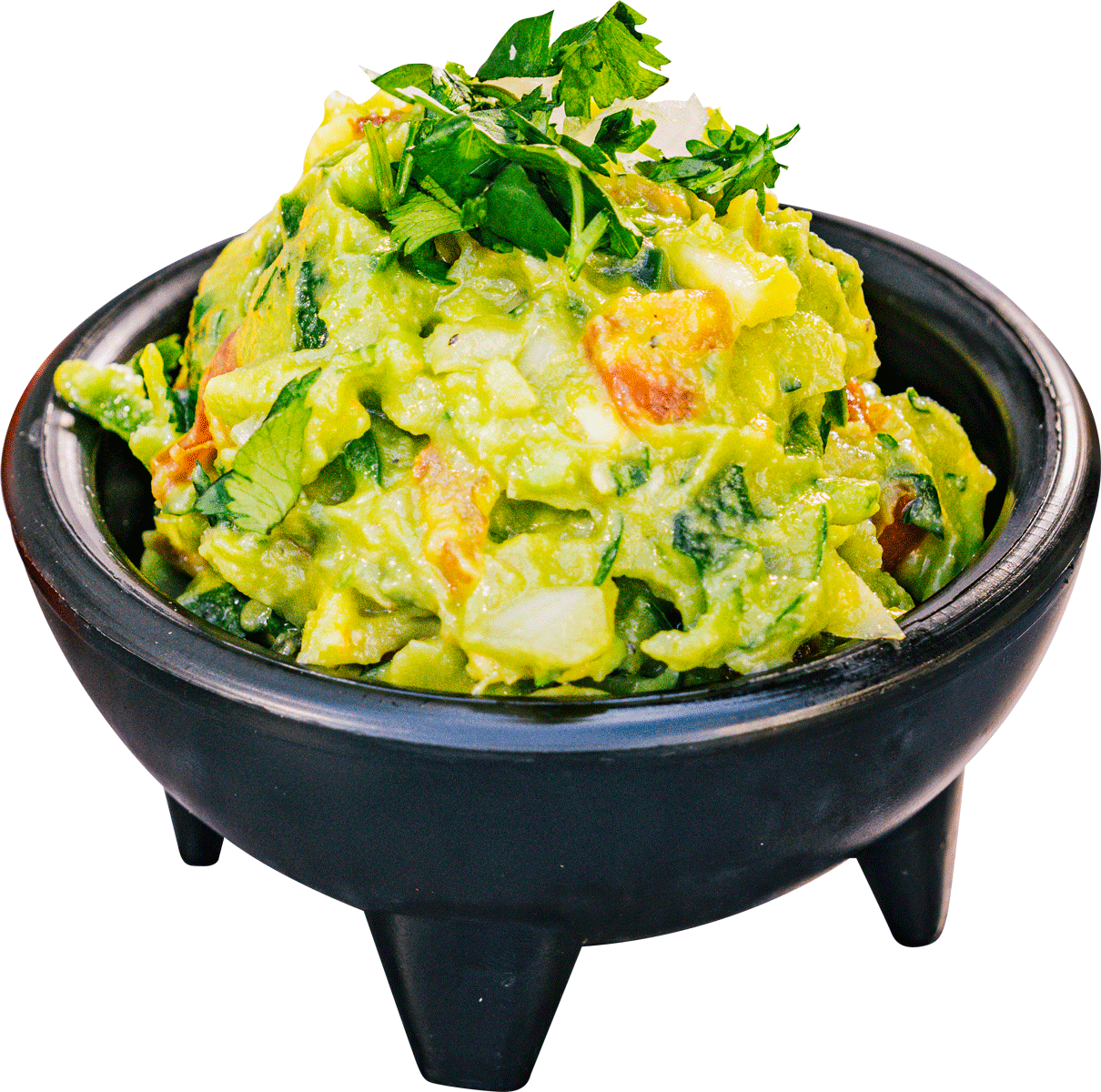 A black bowl filled with guacamole on a white background