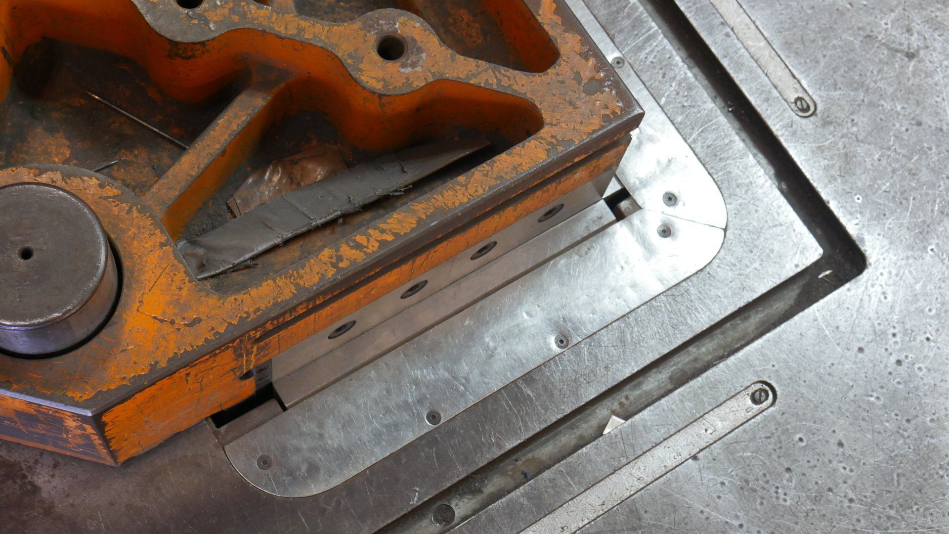 A close up of a piece of metal on a table.