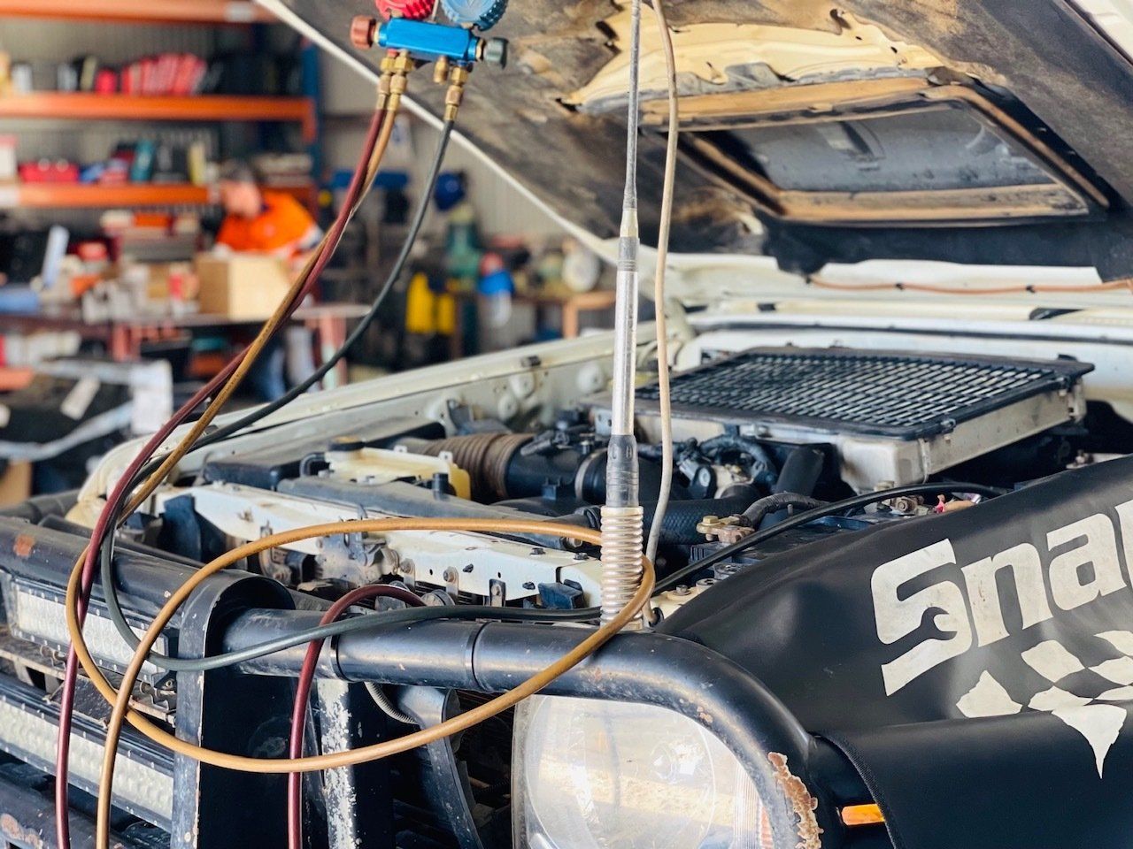 A Snap On Car Is Being Serviced In A Garage — Aspire Diesel In Gracemere, QLD