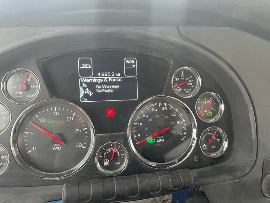 A close up of a dashboard of a vehicle