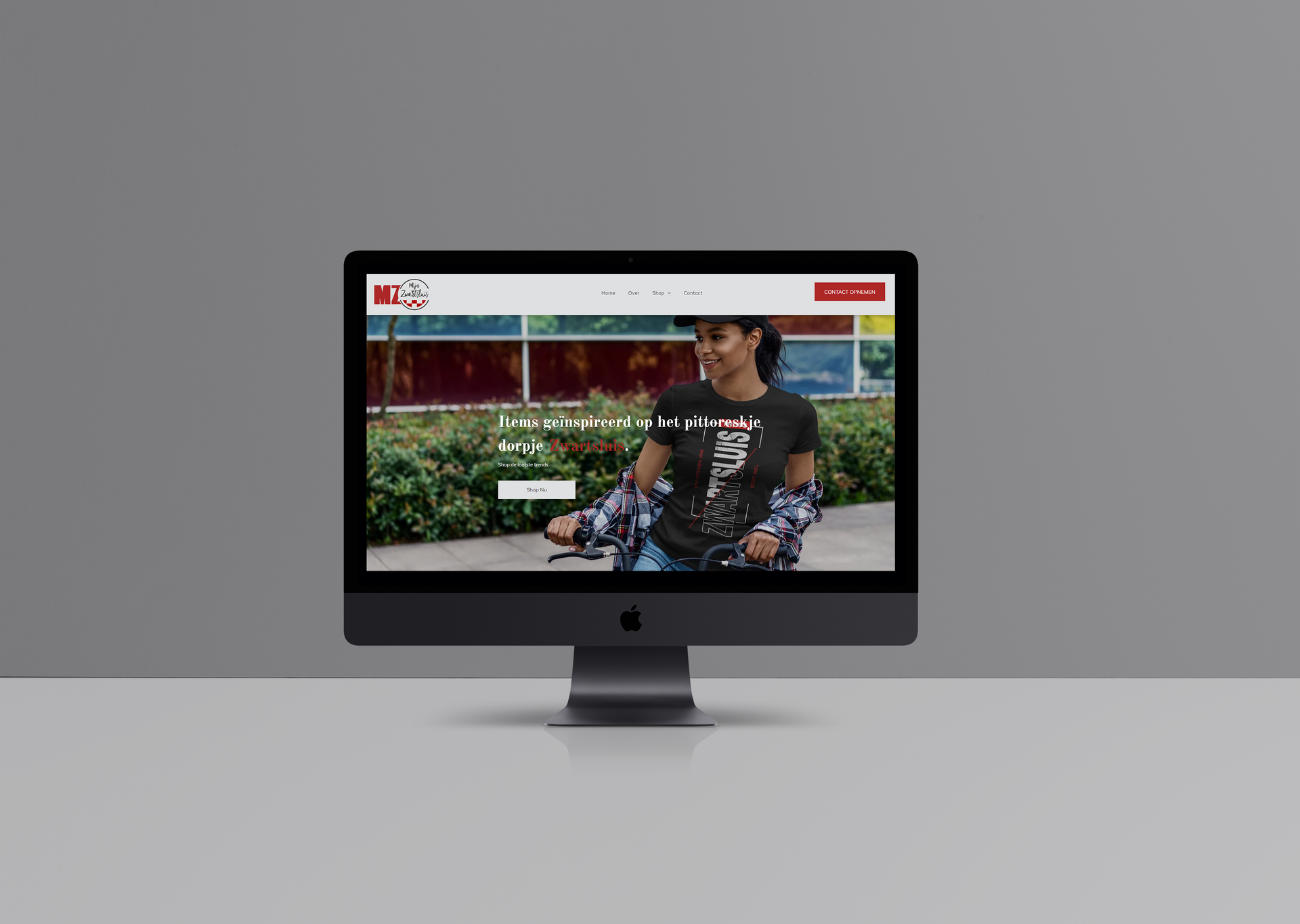 Een computerscherm met een foto van een man erop