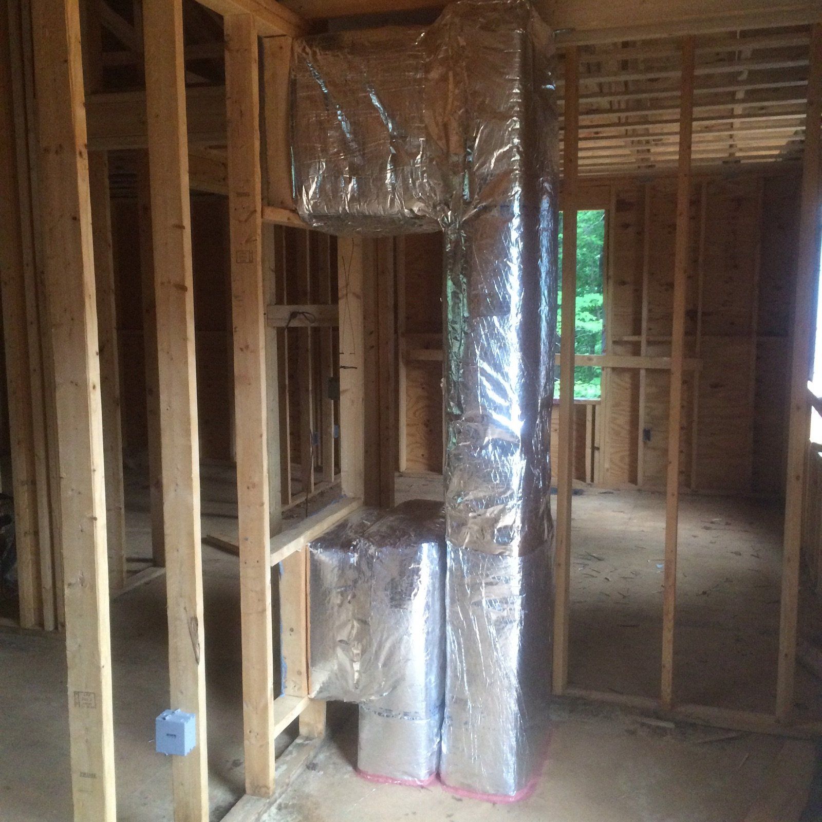 A house currently under construction with only the frame built