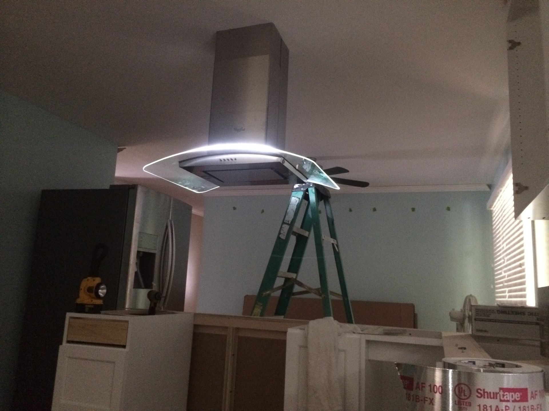 A recently installed vent above where a stove would go