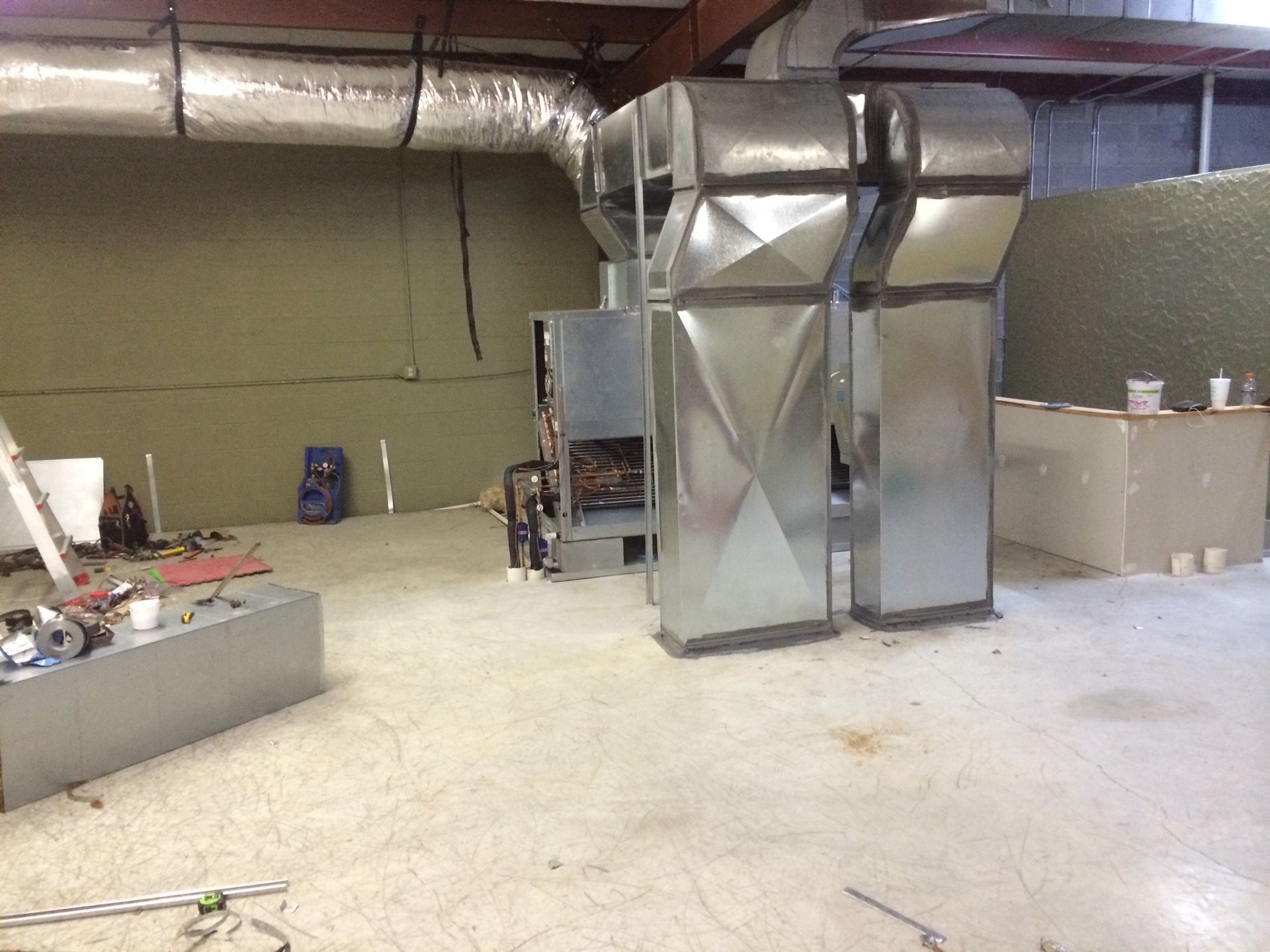 A large heater in an empty room